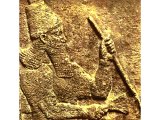 Tiglath Pileser III (`Pul`) on relief from Calah. (British Museum).
